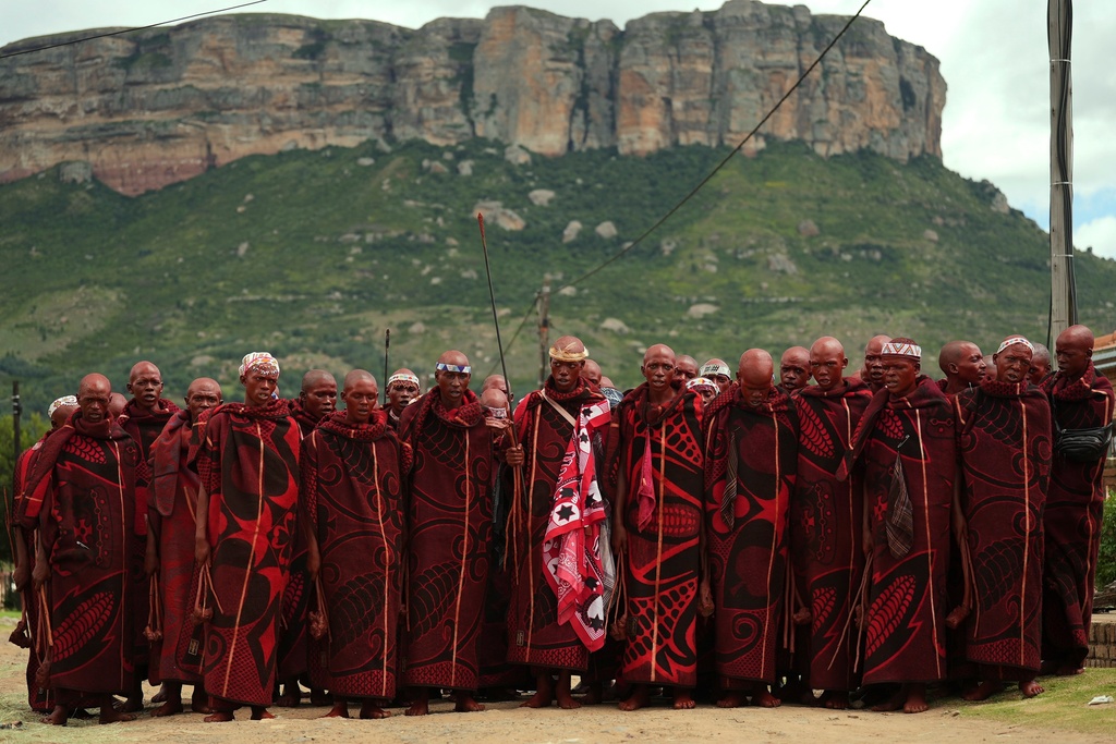 Initiates return after completing their passage to manhood at a traditional initiation school, in Phuthaditjhaba, South Africa, Saturday, Jan. 3, 2026. (AP Photo/Alfonso Nqunjana)