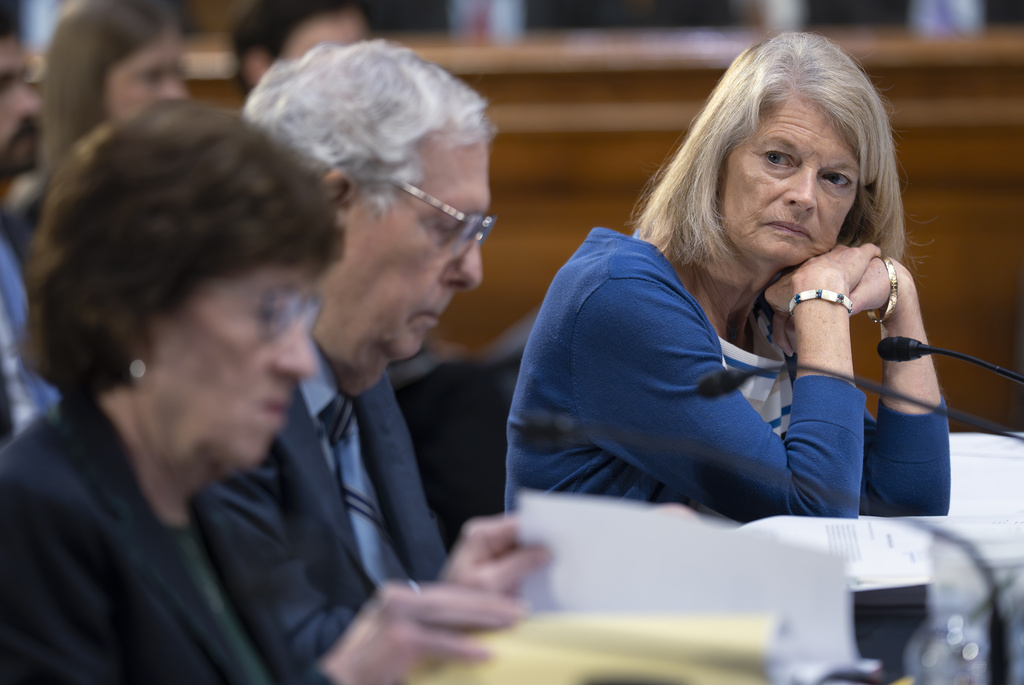 Sen. Lisa Murkowski, R-Alaska, right, listens as the Senate Appropriations Committee marks up the FY2026 spending bill for the Department of the Interior, the Environmental Protection Agency, Department of Transportation, and the Department of Housing and Urban Development, at the Capitol in Washington, Thursday, July 24, 2025. (AP Photo/J. Scott Applewhite)