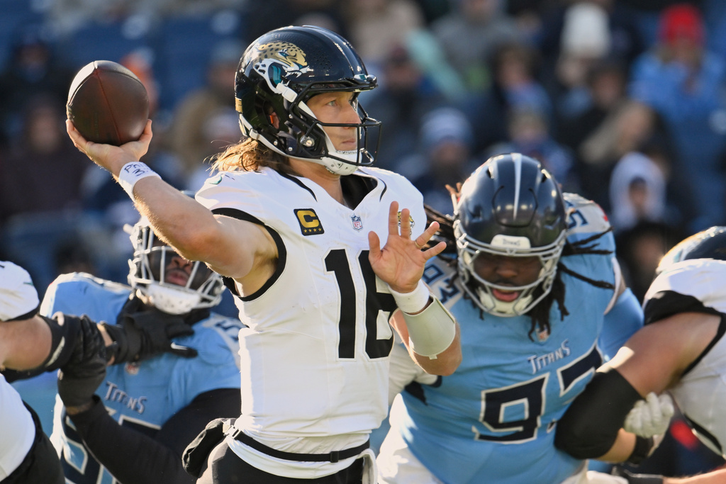 Jacksonville Jaguars quarterback Trevor Lawrence (16) throws a pass against the Tennessee Titans during the second half of an NFL football game Sunday, Nov. 30, 2025, in Nashville, Tenn. (AP Photo/John Amis)