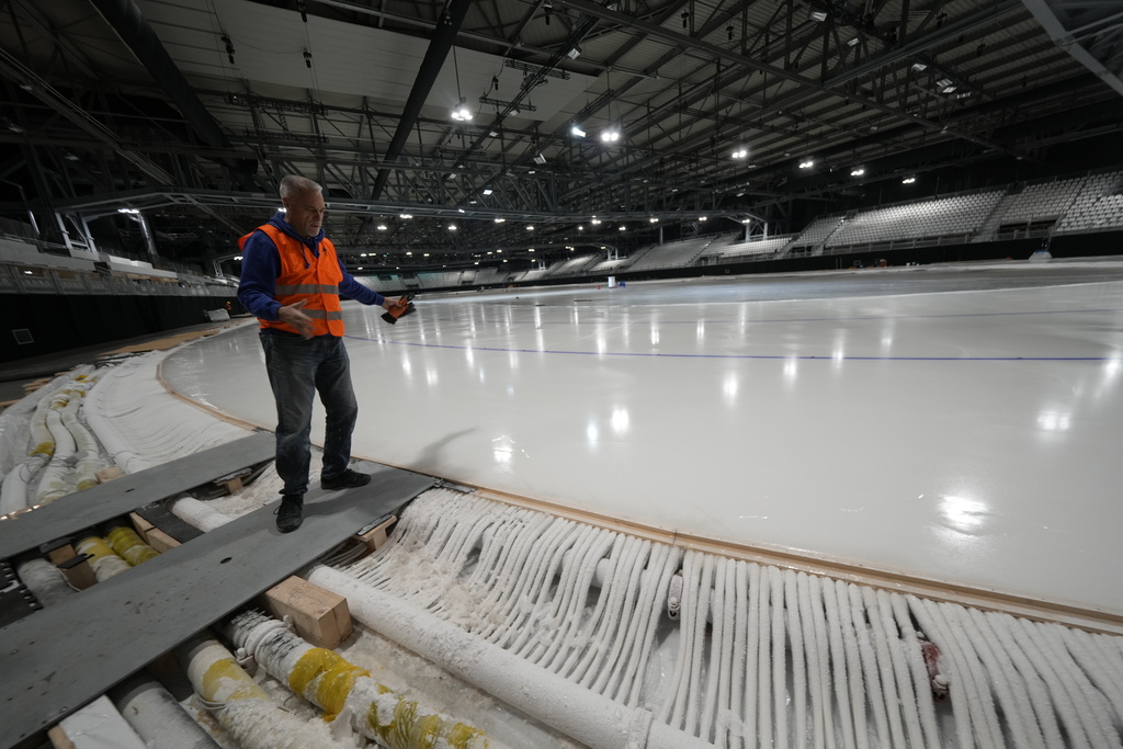 Ice Master Mark Messer poses in the stadium where speed skating discipline of the Milan Cortina 2026 Winter Olympics will take place, in Rho, outskirt of Milan, Tuesday, Nov. 11, 2025. (AP Photo/Luca Bruno)