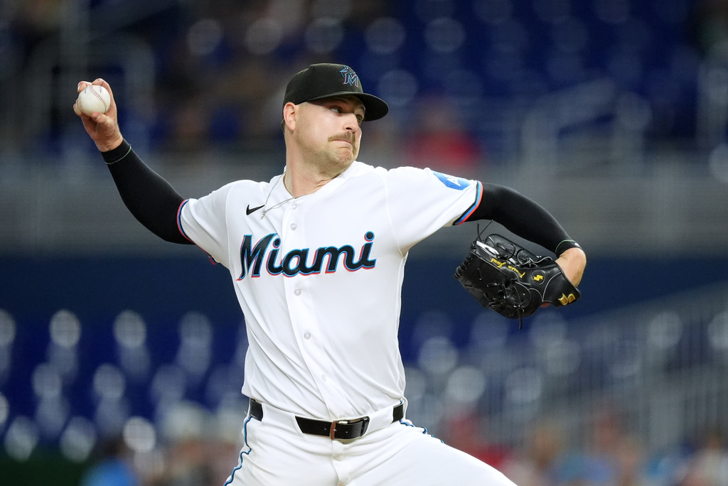 Miami Marlins starting pitcher Janson Junk pitches during the first inning of a baseball game against the Philadelphia Phillies, Monday, May 4, 2026, in Miami. (AP Photo/Rebecca Blackwell)
