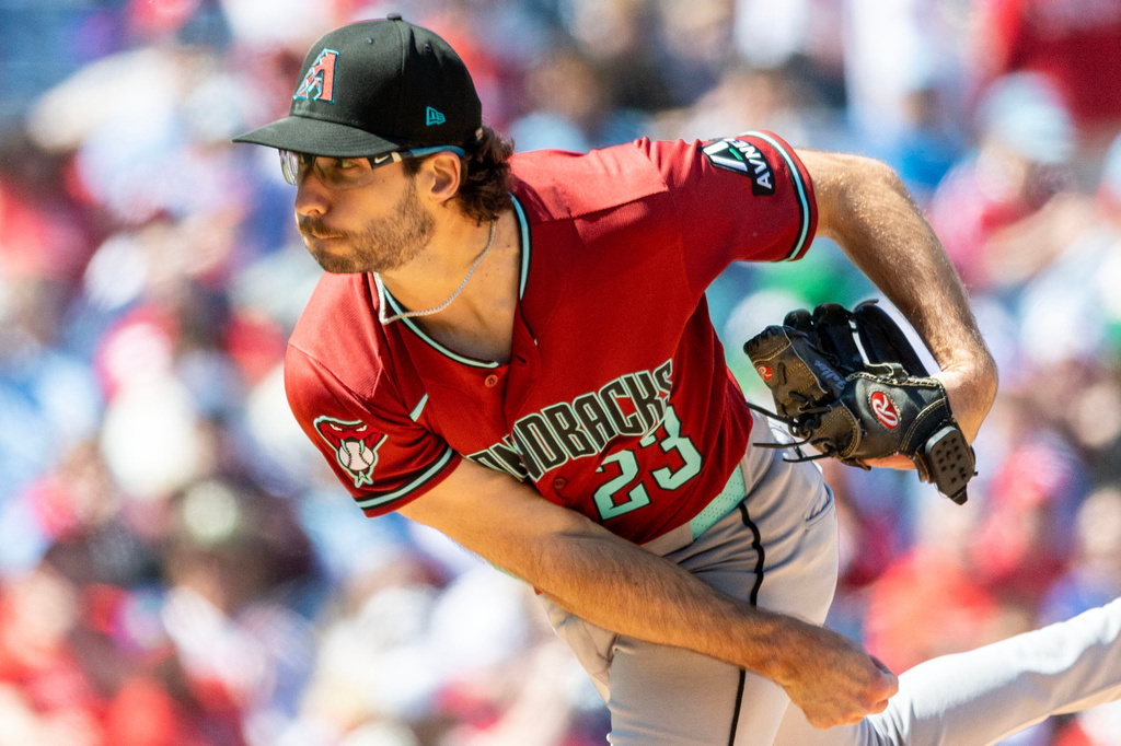 Arizona Diamondbacks starting pitcher Zac Gallen throws in the first inning of a baseball game against the Philadelphia Phillies, Sunday, April 12, 2026, in Philadelphia. (AP Photo/Laurence Kesterson)
