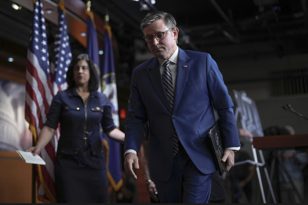 Speaker of the House Mike Johnson, R-La., and GOP leaders depart after meeting with reporters as he tries to advance a spending package for the Iran war, farm aid and President Donald Trump's push for strict new voter ID requirements, at the Capitol in Washington, Tuesday, July 21, 2026. (AP Photo/J. Scott Applewhite)