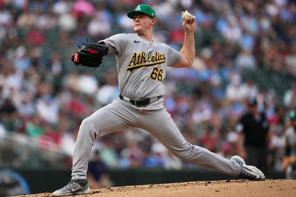 Athletics pitcher Brady Basso throws to the Minnesota Twins during the first inning of a baseball game, Saturday, July 25, 2026, in Minneapolis. (AP Photo/Ellen Schmidt)