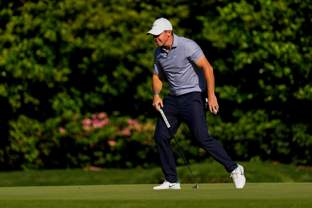 Rory McIlroy, of Northern Ireland, reacts after missing a putt on the 11th hole during the third round of the Masters golf tournament at the Augusta National Golf Club, Saturday, April 11, 2026, in Augusta, Ga. (AP Photo/Gerald Herbert)