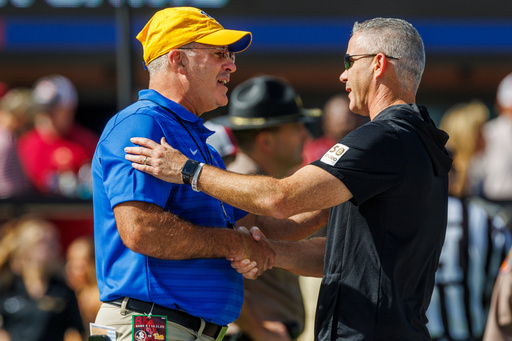 Pittsburgh head coach Pat Narduzzi, left, and Florida State head coach Mike Norvell talk prior to an NCAA college football game, Saturday, Oct. 11, 2025, in Tallahassee, Fla. (AP Photo/Colin Hackley) Pittsburgh head coach Pat Narduzzi, left, and Florida State head coach Mike Norvell talk prior to an NCAA college football game, Saturday, Oct. 11, 2025, in Tallahassee, Fla. (AP Photo/Colin Hackley)