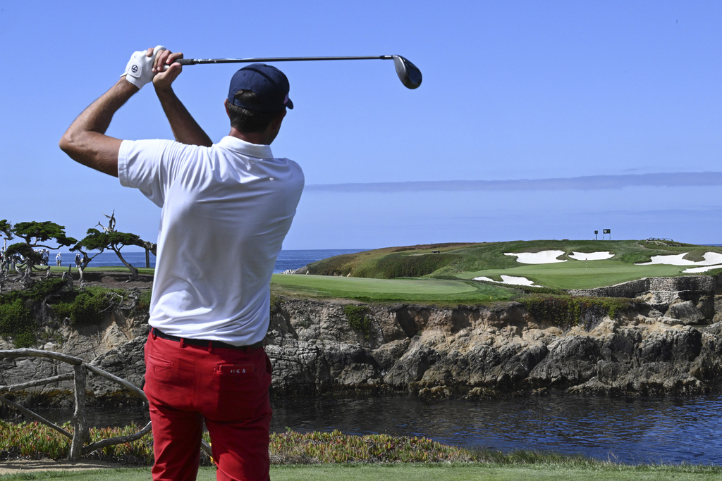 The USA team's Stewart Hagestad makes his approach shot to the 16th hole during Walker Cup golf matches against the Great Britain and Ireland team at Cypress Point Club on Saturday, Sept. 6, 2025, in Pebble Beach, Calif. (AP Photo/Thien-An Truong)