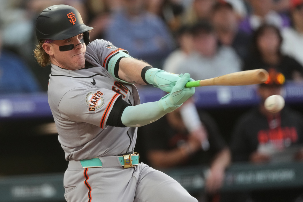FILE - San Francisco Giants' Harrison Bader (9) bats in the fourth inning of a baseball game, May 29, 2026, in Denver. (AP Photo/David Zalubowski, File)
