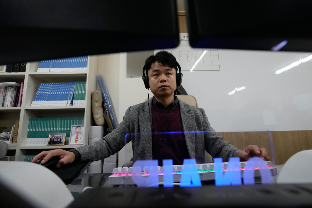 Paek Yosep, a staff of the Korea Internet Studio, works at his office in Seoul, South Korea, Tuesday, Nov. 18, 2025. (AP Photo/Ahn Young-joon)