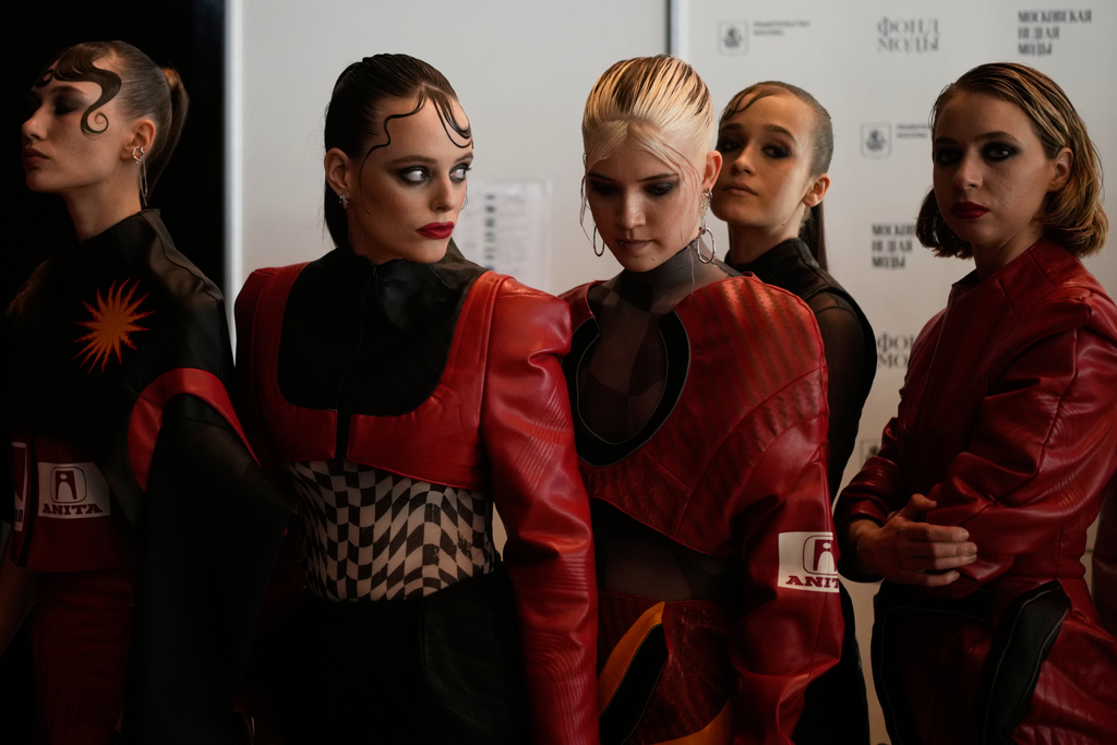 Models are prepared for a runway show at the backstage of the Moscow Fashion Week in Moscow, Saturday, March 14, 2026. (AP Photo/Pavel Bednyakov)