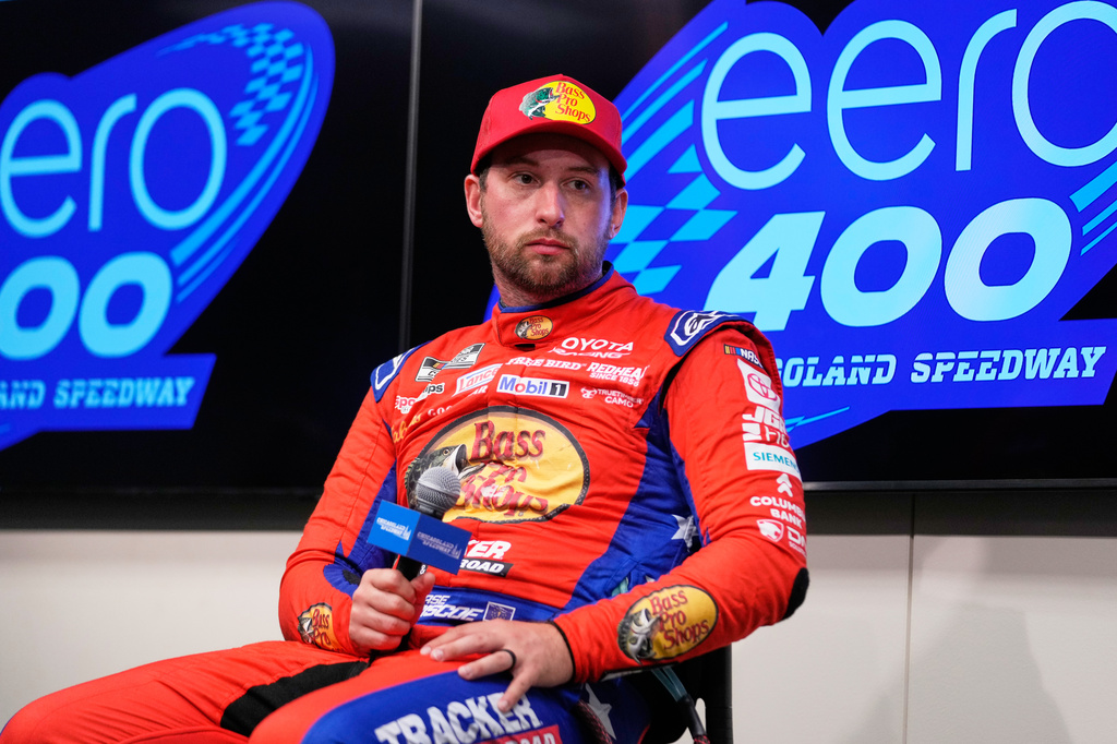 Chase Briscoe (19) talks to media after winning a NASCAR Cup Series Eero 400 auto race at Chicagoland Speedway in Joliet, Ill., Sunday, July 5, 2026. (AP Photo/Nam Y. Huh)
