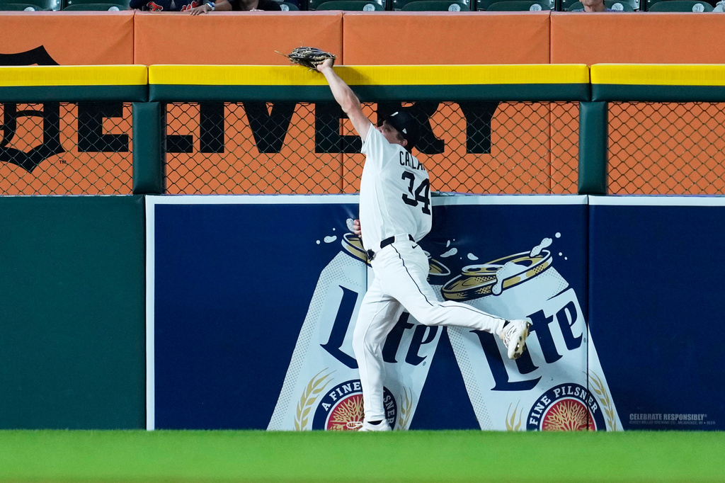 Detroit Tigers left fielder Brett Callahan (34) catches a Minnesota Twins' Ryan Jeffers fly ball during the sixth inning of a baseball game Tuesday, Sept. 8, 2026, in Detroit. (AP Photo/Paul Sancya)