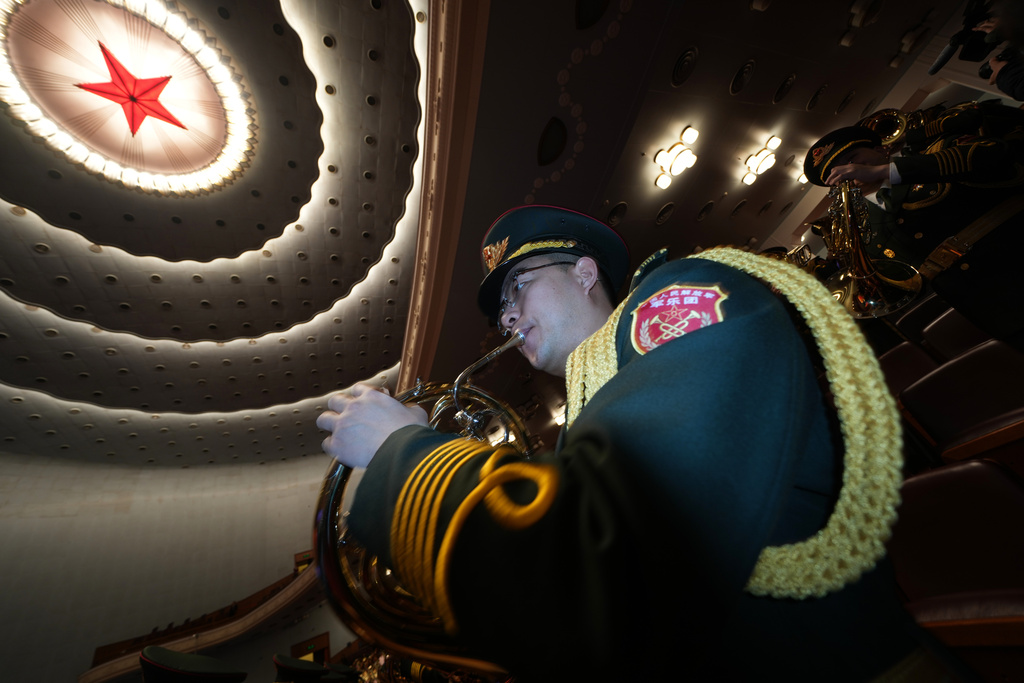 A military band member rehearses before the opening session of the National People's Congress (NPC) in Beijing, Thursday, March 5, 2026. (AP Photo/Ng Han Guan)