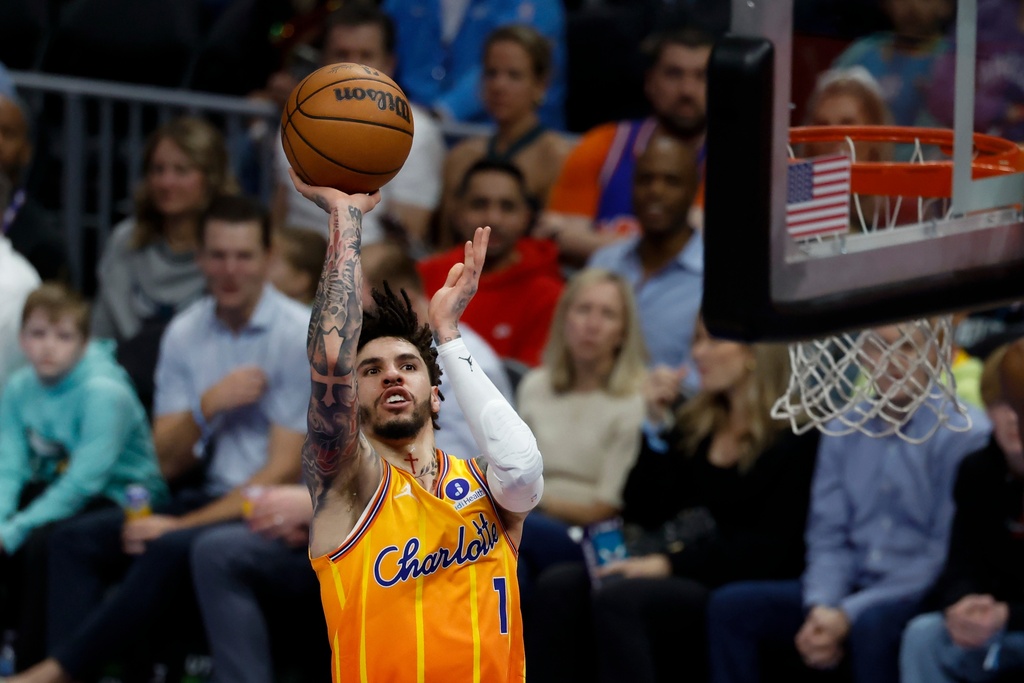 Charlotte Hornets guard LaMelo Ball shoots against the Cleveland Cavaliers during the first half of an NBA basketball game in Charlotte, N.C., Friday, Feb. 20, 2026. (AP Photo/Nell Redmond)