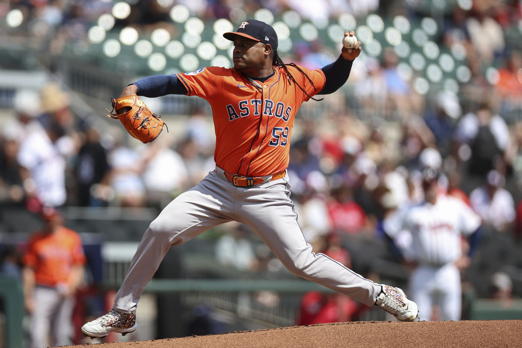 Houston Astros pitcher Framber Valdez (59) delivers in the first inning of a baseball game against the Atlanta Braves, Sunday, Sept. 14, 2025, in Atlanta. (AP Photo/Colin Hubbard)