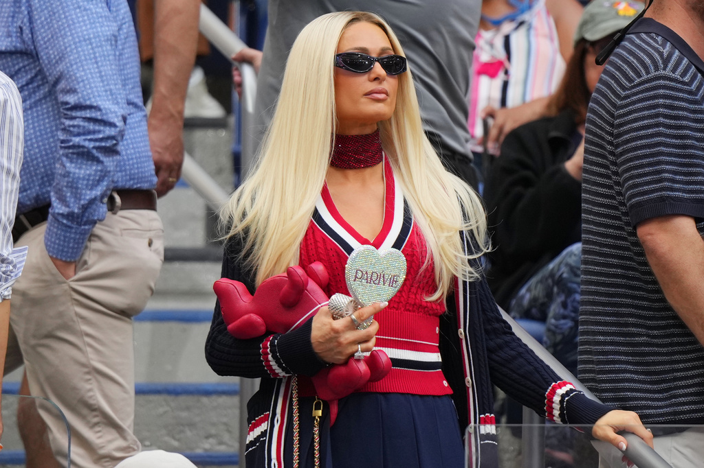 Paris Hilton attends a match between Elena Rybakina, of Kazakhstan, and Aryna Sabalenka, of Belarus, during the women's singles final of the U.S. Open tennis championships Saturday, Sept. 12, 2026, in New York. (AP Photo/Kirsty Wigglesworth)
