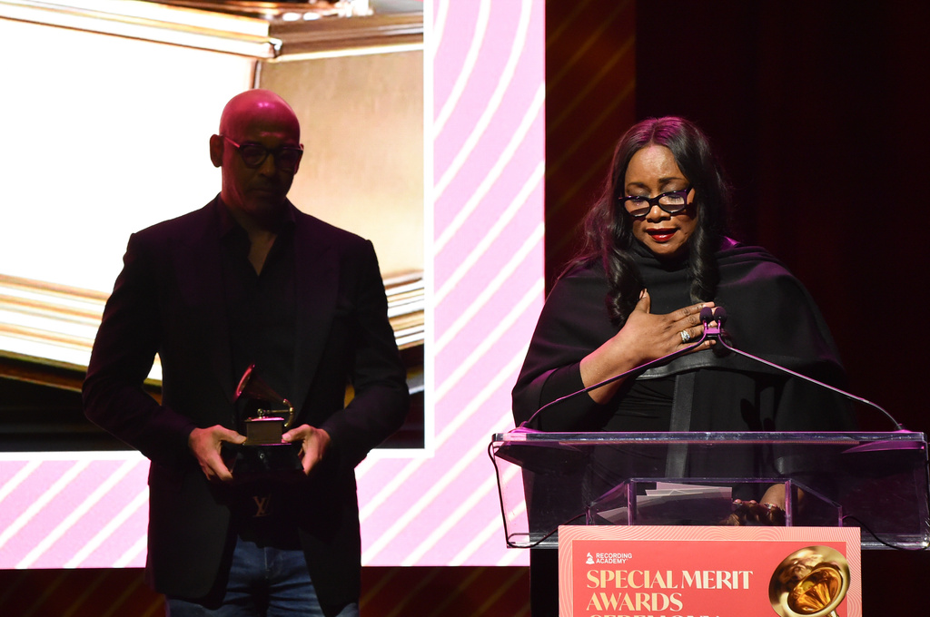 FILE - Pat Houston accepts the lifetime achievement award on behalf of Whitney Houston during the Recording Academy's Special Merit Awards in Los Angeles on Jan. 31, 2026. (Photo by Richard Shotwell/Invision/AP, File)