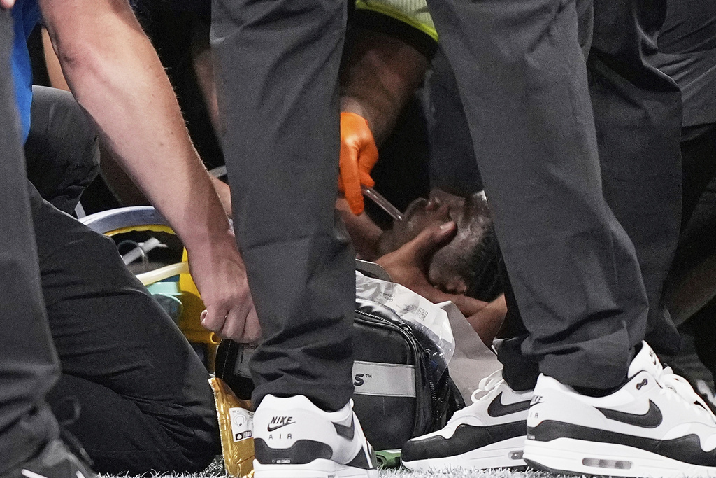 Medical personnel attend to Detroit Lions safety Morice Norris after being injured against the Atlanta Falcons during the second half of an NFL preseason football game Friday, Aug. 8, 2025, in Atlanta. (AP Photo/Brynn Anderson)