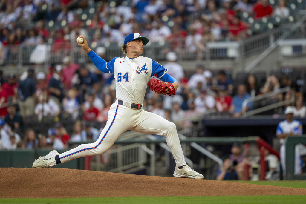 Atlanta Braves pitcher Hurston Waldrep (64) throws the first pitch during the first inning of a baseball game against the Seattle Mariners Saturday, Sept. 6, 2025, in Atlanta. (AP Photo/Erik Rank)