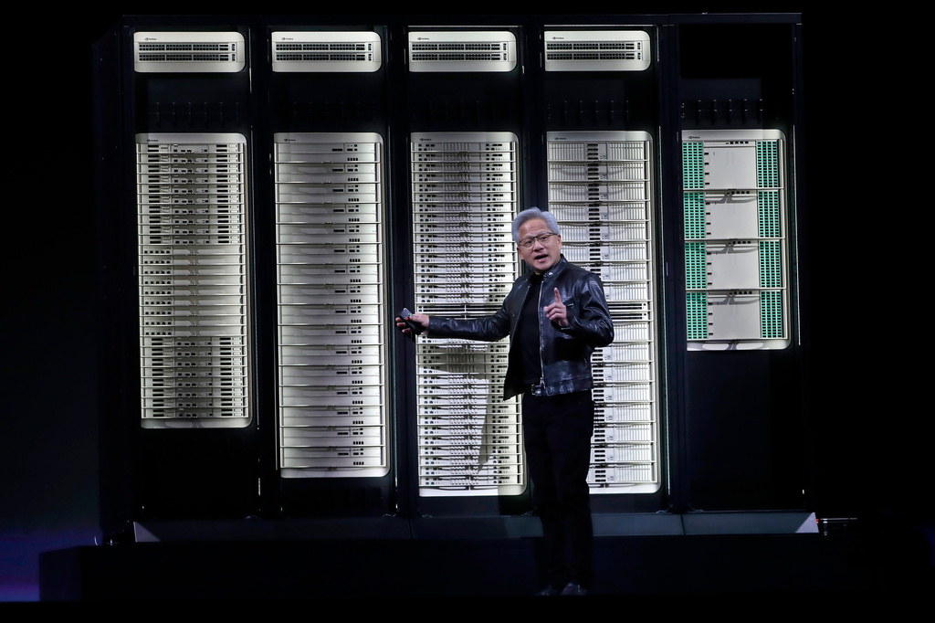 Nvidia CEO Jensen Huang delivers a speech during the Computex 2026 exhibition in Taipei, Taiwan, Monday, June 1, 2026. (AP Photo/Chiang Ying-ying)
