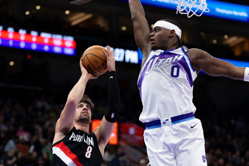 Portland Trail Blazers forward Deni Avdija (8) shoots over Utah Jazz forward Taylor Hendricks (0) during the first half of an NBA basketball game, Wednesday, Oct. 29, 2025, in Salt Lake City. (AP Photo/Anna Fuder) Portland Trail Blazers forward Deni Avdija (8) shoots over Utah Jazz forward Taylor Hendricks (0) during the first half of an NBA basketball game, Wednesday, Oct. 29, 2025, in Salt Lake City. (AP Photo/Anna Fuder)