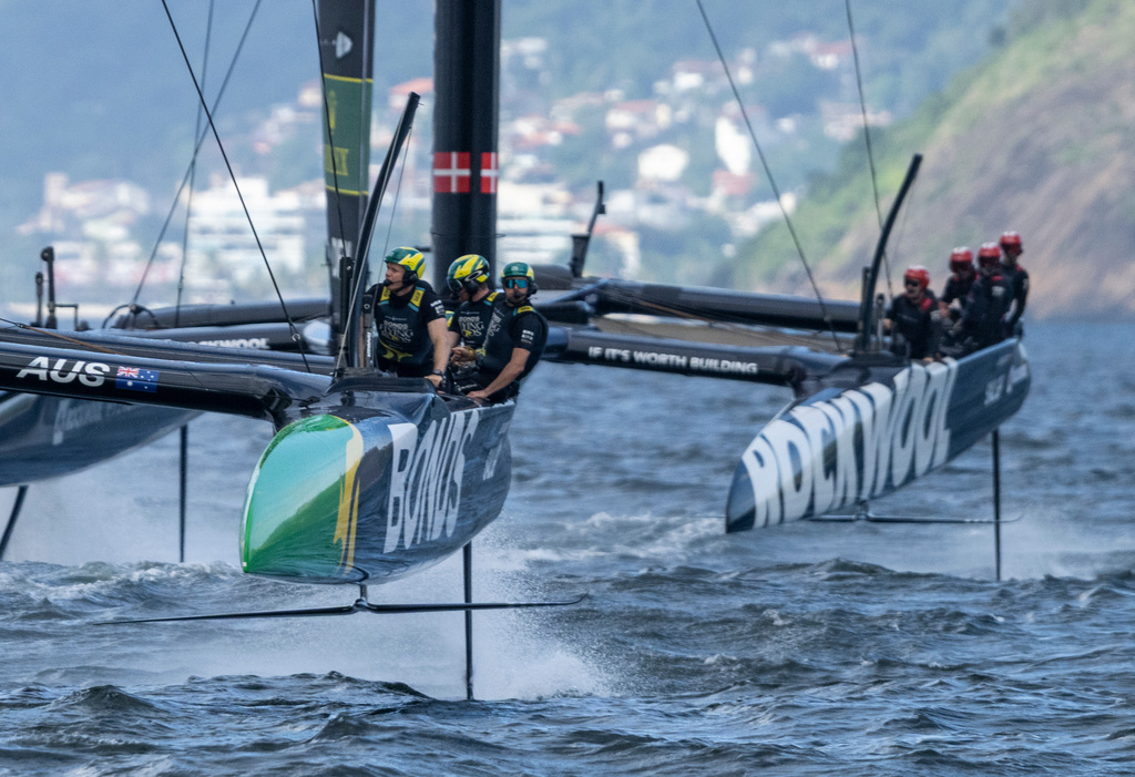 In this photo provided by SailGP, BONDS Flying Roos SailGP Team, driven by Tom Slingsby, compete ahead of ROCKWOOL Racing SailGP Team, driven by Nicolai Sehested, on Race Day 2 of the ENEL Rio Sail Grand Prix in Rio de Janeiro, Brazil, Sunday, April 12, 2026. (Ricardo Pinto/SailGP via AP)