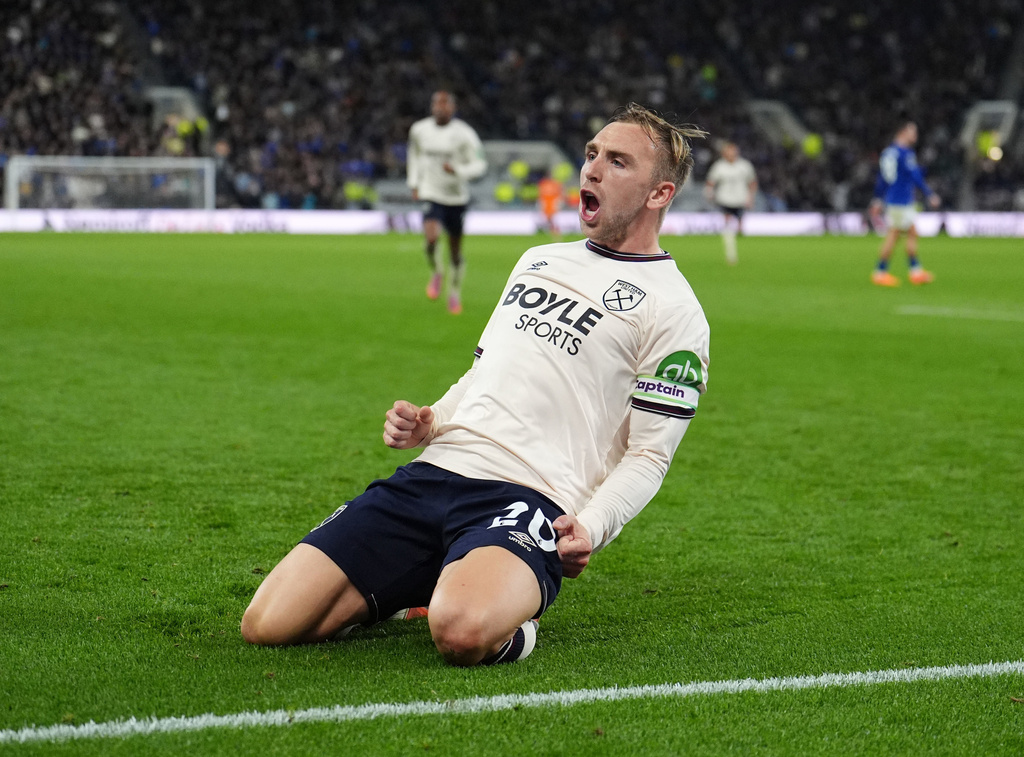 West Ham United's Jarrod Bowen celebrates scoring their side's first goal during the English Premier League soccer match between Everton and West Ham United at the Hill Dickinson Stadium, Liverpool, England, Monday, Sept. 29, 2025. (Martin Rickett/PA via AP)
