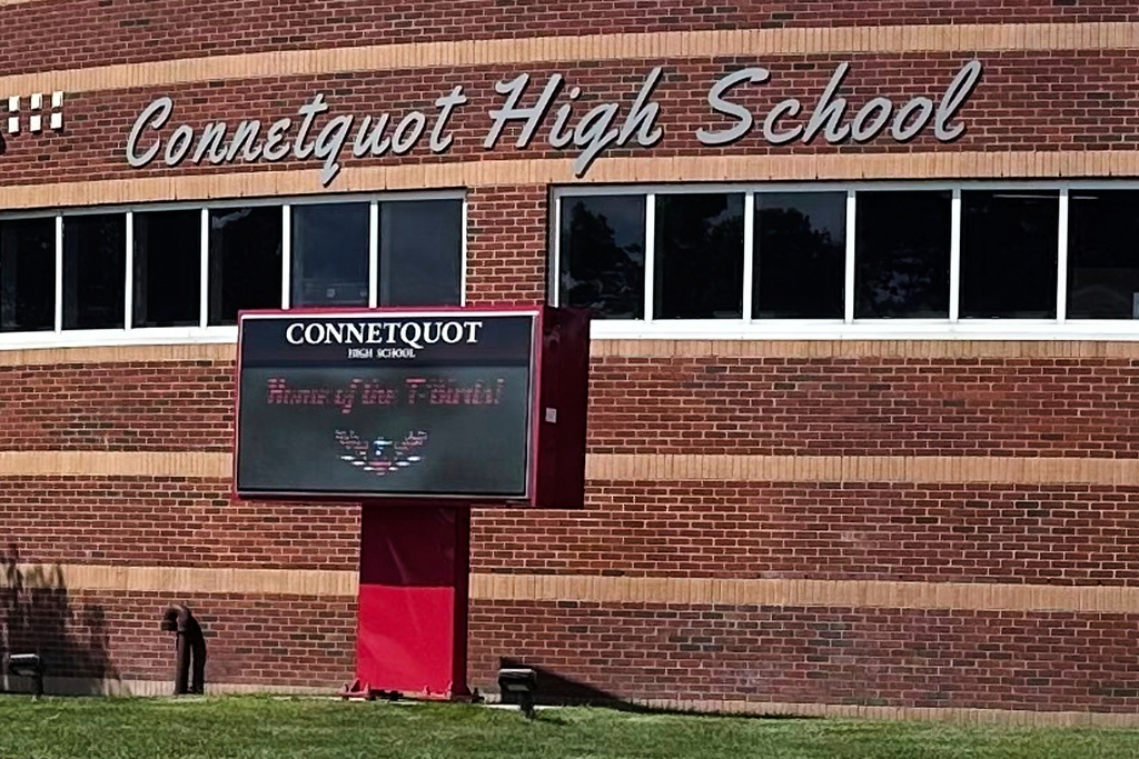 FILE - An electronic display shows the new mascot name, T-Birds, outside Connetquot High School in Bohemia, N.Y., Sept. 4, 2025. (AP Photo/Philip Marcelo, File)