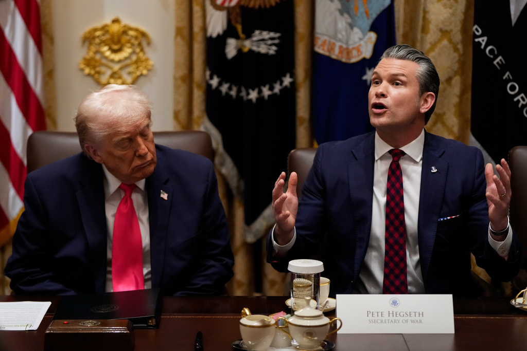 President Donald Trump closes his eyes as Defense Secretary Pete Hegseth speaks during a Cabinet meeting at the White House, Tuesday, Dec. 2, 2025, in Washington. (AP Photo/Julia Demaree Nikhinson)