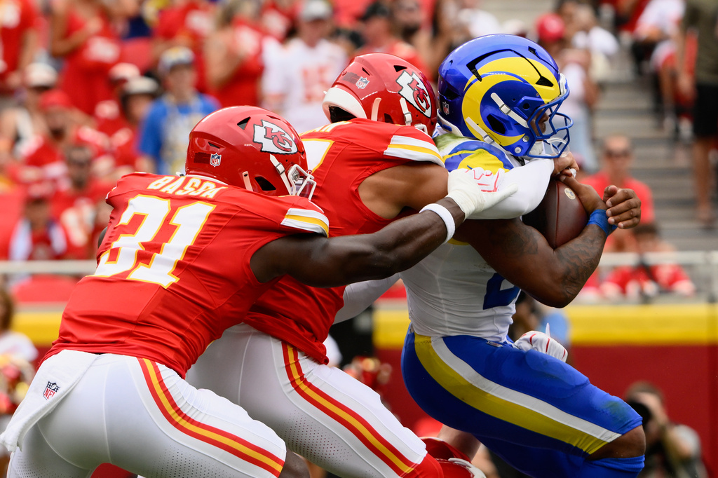 Los Angeles Rams running back Kyren Williams is tackled by the Kansas City Chiefs during the first half of an NFL preseason football game, Saturday, Aug. 15, 2026, in Kansas City, MO. (AP Photo/Reed Hoffmann)