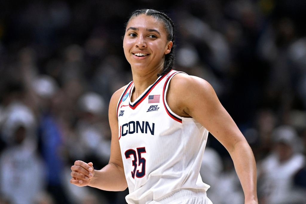UConn guard Azzi Fudd (35) reacts after making another 3-point basket during the first half in the second round of the NCAA college basketball tournament against Syracuse, Monday, March 23, 2026, in Storrs, Conn. (AP Photo/Jessica Hill)