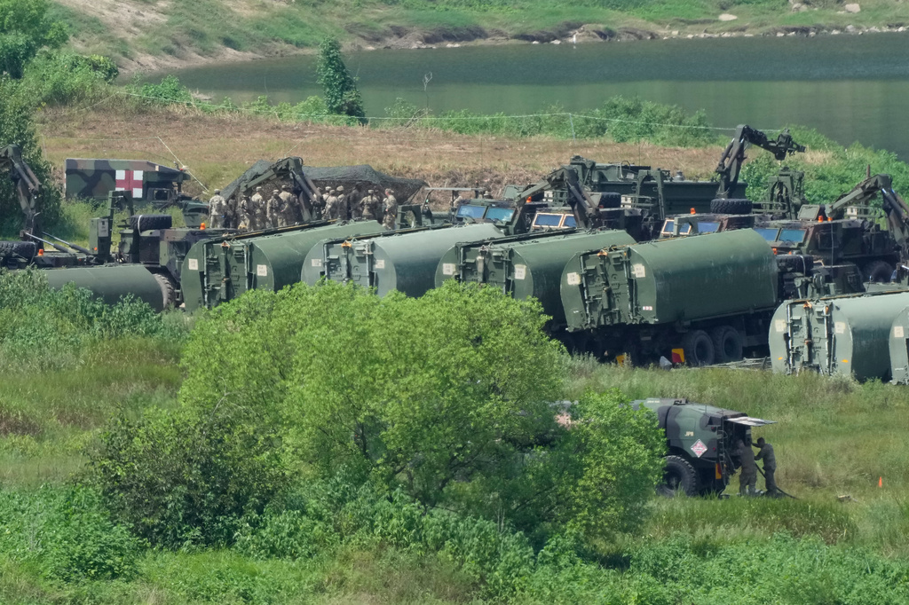The U.S. Army's armored vehicles gather to cross a river at a training field in Yeoncheon, South Korea, near the border with North Korea, Tuesday, Aug. 18, 2026. (AP Photo/Ahn Young-joon)