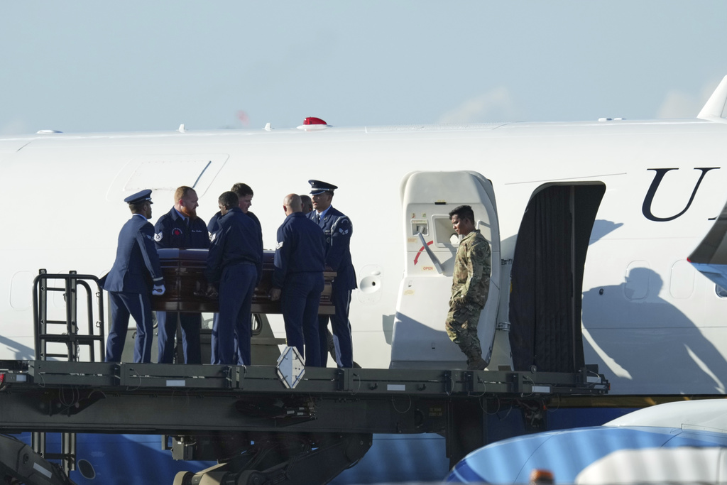 The casket containing the body of Charlie Kirk, the CEO and co-founder of Turning Point USA who was shot and killed on Wednesday is removed from Air Force Two at Phoenix Sky Harbor International Airport, Thursday, Sept. 11, 2025, in Phoenix. (AP Photo/Ross D. Franklin)
