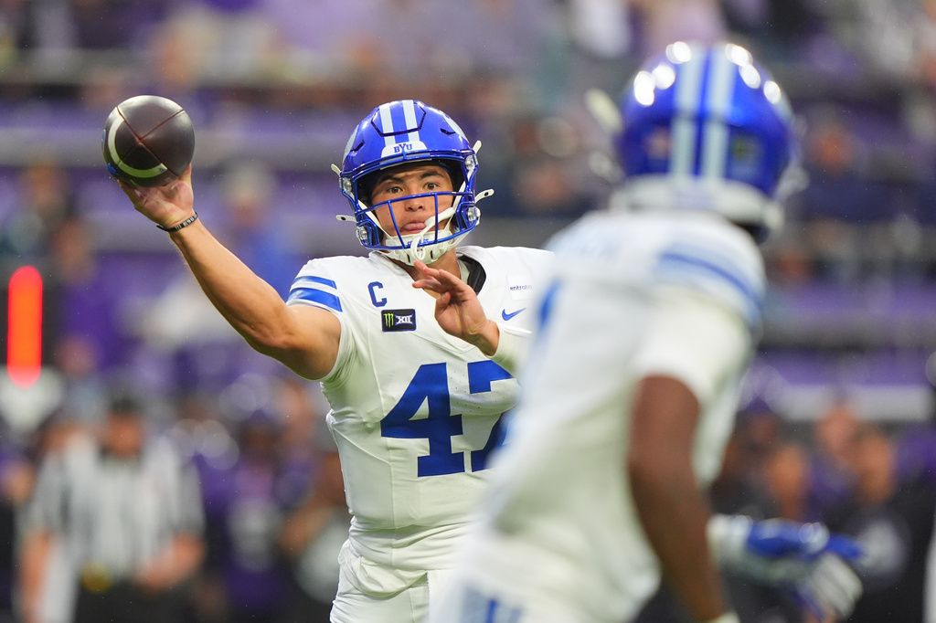 BYU quarterback Bear Bachmeier (47) looks to pass the ball during the first half of an NCAA college football game against TCU, Saturday, Oct. 3, 2026, in Fort Worth, Texas. (AP Photo/LM Otero)
