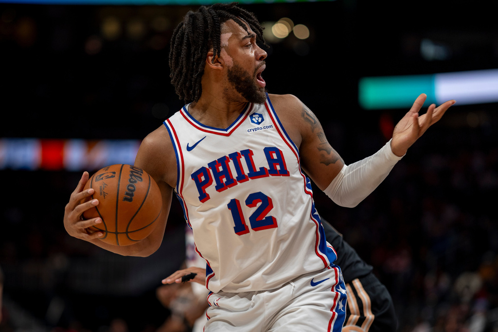 Philadelphia 76ers guard/forward Trendon Watford (12) reacts after a call during the first half of an NBA basketball game against the Atlanta Hawks, Saturday, March 7, 2026, in Atlanta. (AP Photo/Erik Rank)