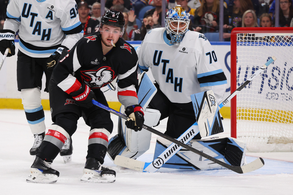Buffalo Sabres left wing Zach Benson (6) skates in front of Utah Mammoth goaltender Karel Vejmelka (70) during the first period of an NHL hockey game Saturday, Oct. 10, 2026, in Buffalo, N.Y. (AP Photo/Jeffrey T. Barnes)