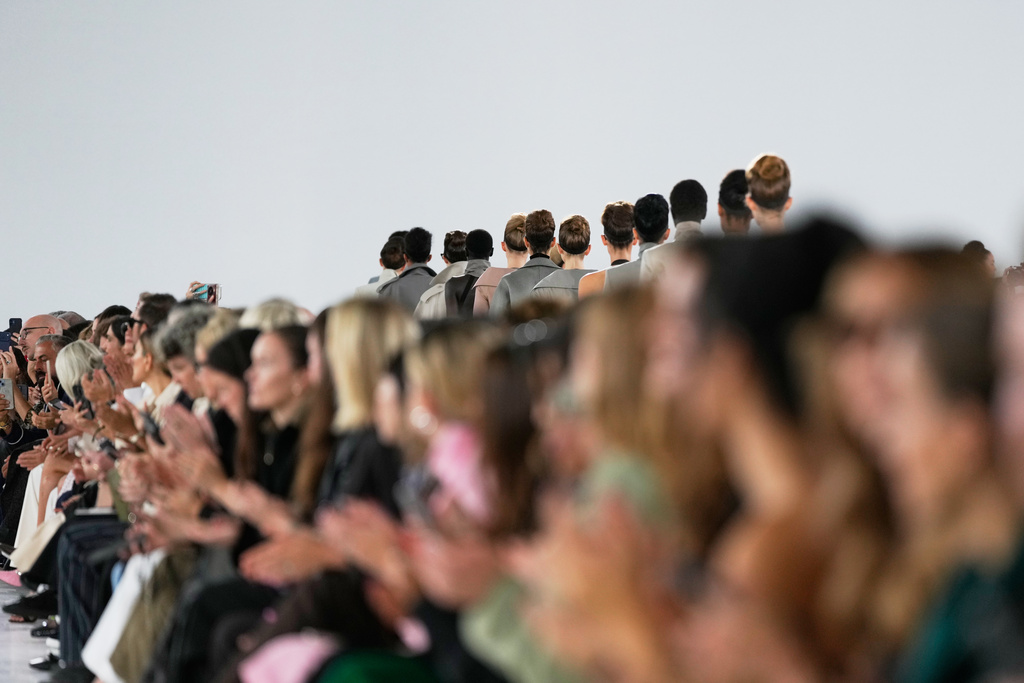Models leave at the end of the Max Mara women's Spring-Summer 2026 collection, presented in Milan, Italy, Thursday, Sept. 25, 2025. (AP Photo/Luca Bruno)