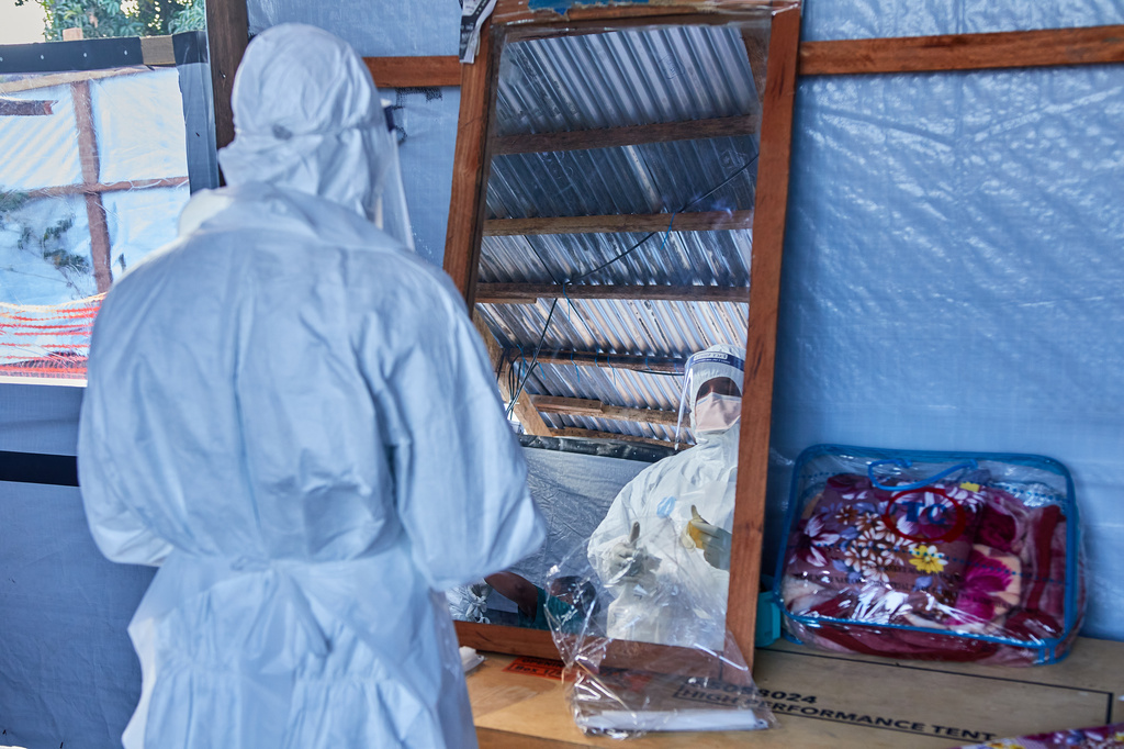 A view of a health worker at the Evangelical Medical Center, in Bunia, eastern Congo, Friday, July 3, 2026, where Ebola clinical trials are scheduled to take place. (AP Photo/Dirole Lotsima Dieudonne)