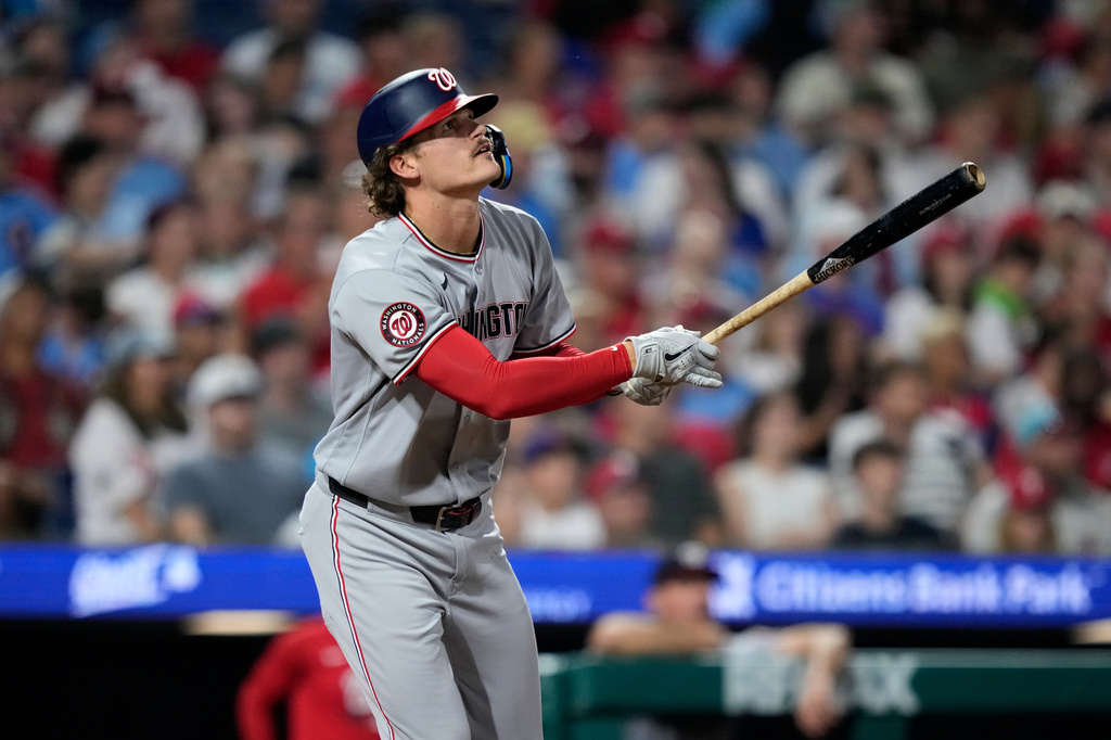 Washington Nationals' Brady House watches after hiting a home run against Philadelphia Phillies' Brooks Raley during the seventh inning of a baseball game Wednesday, Aug. 5, 2026, in Philadelphia. (AP Photo/Matt Slocum)