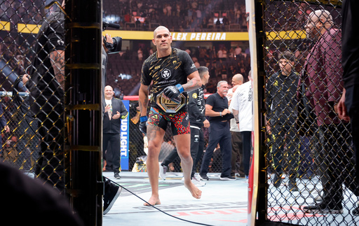 Alex Pereira, of Brazil, leaves the Octagon after defeating UFC light heavyweight champion Magomed Ankalaev, of Russia, during UFC 320 Saturday, Oct. 4, 2025, in Las Vegas. (Steve Marcus/Las Vegas Sun via AP) Alex Pereira, of Brazil, leaves the Octagon after defeating UFC light heavyweight champion Magomed Ankalaev, of Russia, during UFC 320 Saturday, Oct. 4, 2025, in Las Vegas. (Steve Marcus/Las Vegas Sun via AP)