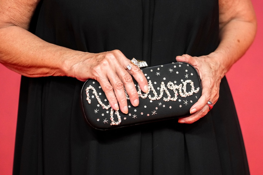 Egyptian actress Youssra poses for a photo on the red carpet during the 22nd Marrakech Film Festival, in Morocco, Tuesday, Dec. 2, 2025. (AP Photo/Mosa'ab Elshamy)