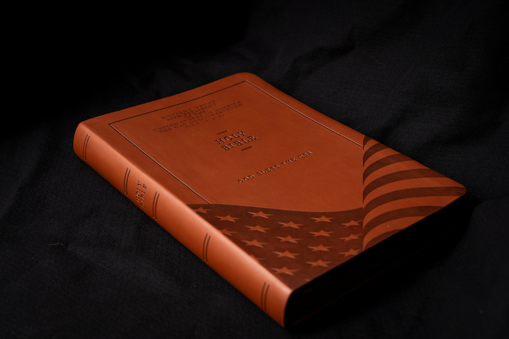 FILE - The front cover of Republican presidential nominee former President Donald Trump's "God Bless the USA" Bible in Washington, Oct. 8, 2024. (AP Photo/Ben Curtis, File)