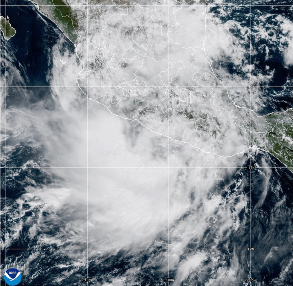 This NOAA satellite image taken at 2:12 p.m. EST on Thursday, Oct. 9, 2025, shows Tropical Storm Raymond off the western coast of Mexico in the eastern Pacific Ocean. (NOAA via AP)