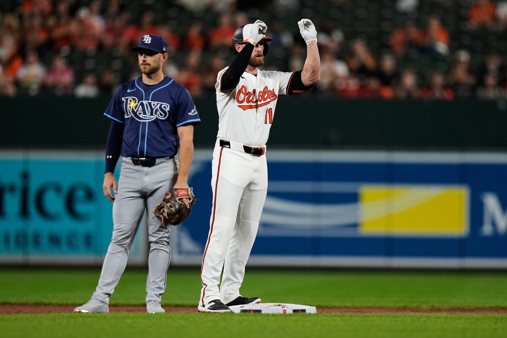 Baltimore Orioles' Jordan Westburg (11) celebrates after hitting a double during the first inning of a baseball game against the Tampa Bay Rays, Tuesday, Sept. 23, 2025, in Baltimore. (AP Photo/Stephanie Scarbrough)