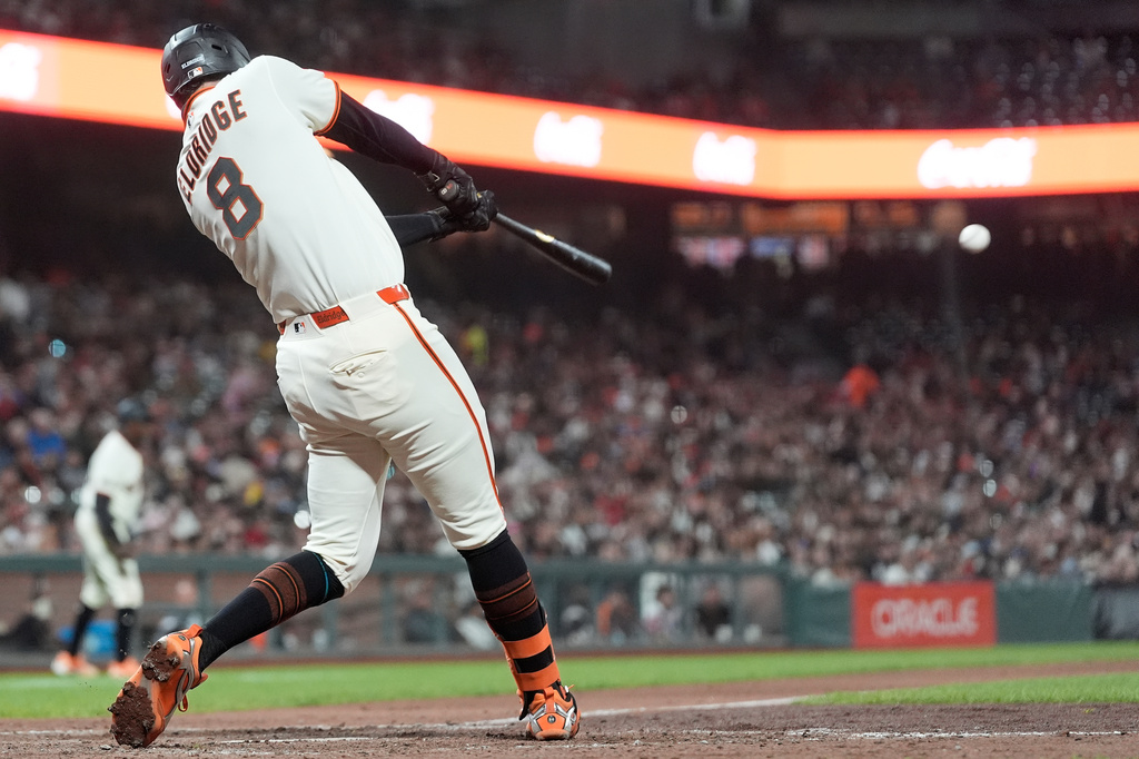 San Francisco Giants' Bryce Eldridge hits a two-run single against the Arizona Diamondbacks during the fifth inning of the second baseball game of a doubleheader, Saturday, Aug. 29, 2026, in San Francisco. (AP Photo/Jeff Chiu)
