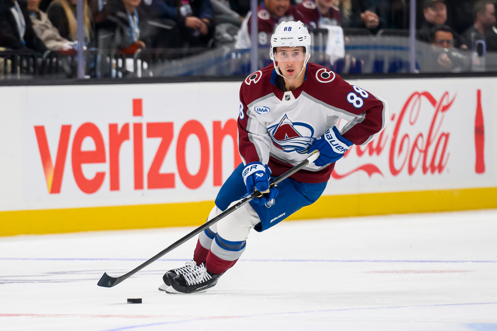 Colorado Avalanche center Martin Necas (88) skates the puck to the net leading to a goal during the third period of an NHL hockey game against the Utah Mammoth, Tuesday, Oct. 21, 2025, in Salt Lake City, Utah. (AP Photo/Tyler Tate)