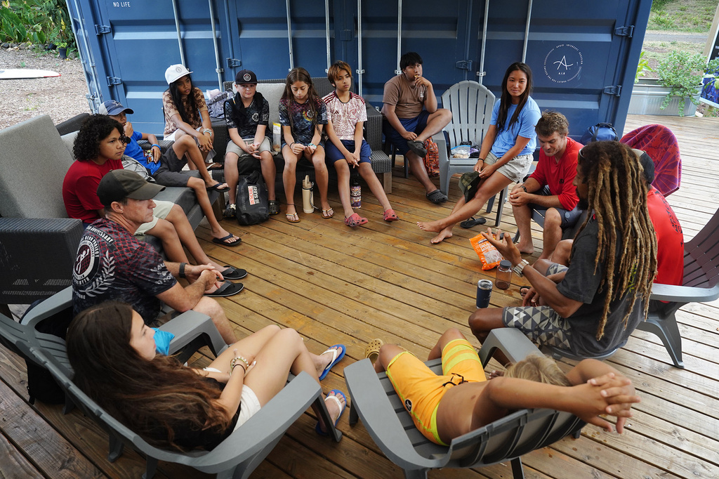 Maui Hero Project and with Kahākūkahi Ocean Academy members talk after their water academy day in Lahaina, Hawaii, on Tuesday, June 10, 2025. (Kevin Fujii/Honolulu Civil Beat via AP)