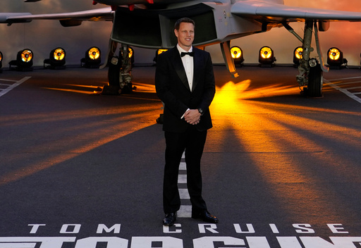 FILE - Producer David Ellison poses for the media during the 'Top Gun Maverick' UK premiere at a central London cinema, on May 19, 2022. (AP Photo/Alberto Pezzali, File) FILE - Producer David Ellison poses for the media during the 'Top Gun Maverick' UK premiere at a central London cinema, on May 19, 2022. (AP Photo/Alberto Pezzali, File)