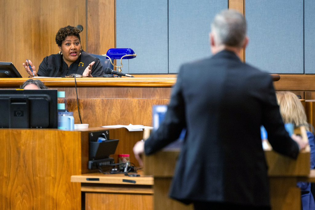 Newport News Circuit Court Judge Rebecca M. Johnson talks with attorneys during pretrial motions in the trial of Ebony Parker on felony child neglect charges at the Newport News Circuit Court in Newport News, Va., Monday, May 18, 2026. (Peter Casey/The Virginian-Pilot via AP, Pool)