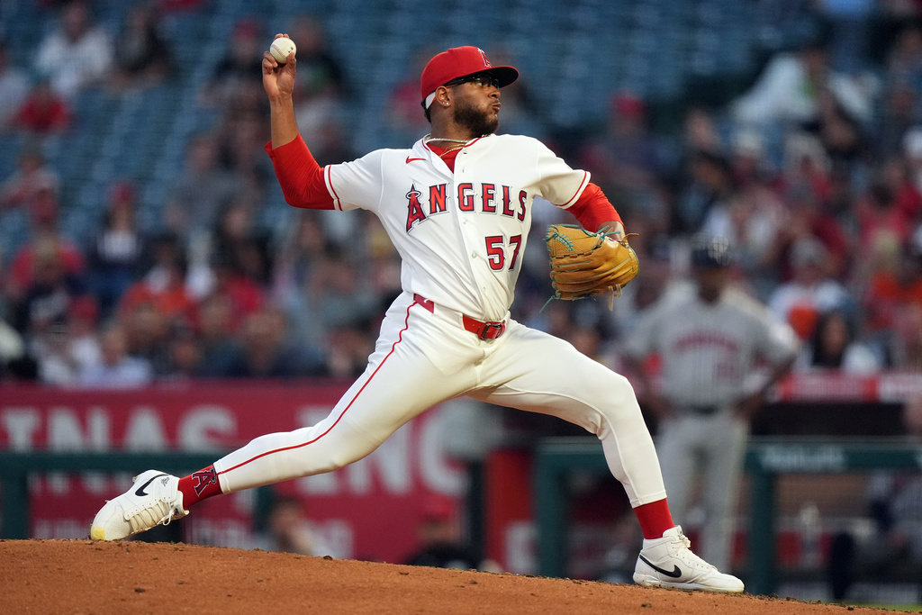 Los Angeles Angels pitcher Walbert Urena (57) delivers against the Houston Astros during the fourth inning in a baseball game Tuesday, June 9, 2026, in Anaheim, Calif. (AP Photo/Scott Strazzante)